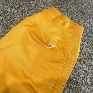 GYMSHARK yellow spandex biker shorts